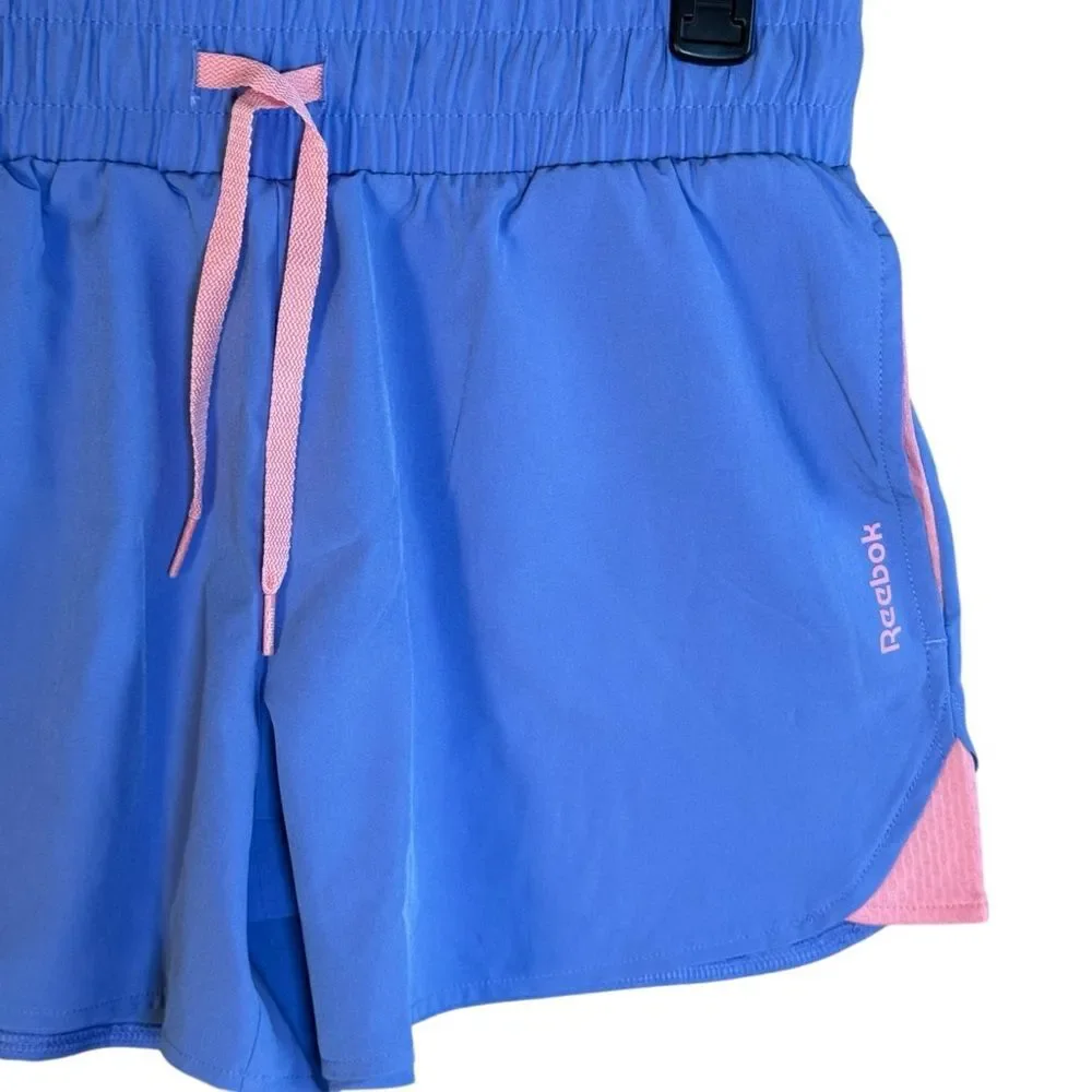 Reebok Women's Stretch Woven Althetic Shorts Size Small Periwinkle Peach NWOT